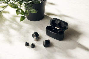 <img src="Cystal_5A_Black_with_plant.jpg"alt="Velacy Crystal 5A earbuds with open case">